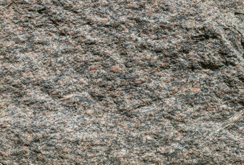 Rough grey granite stone
