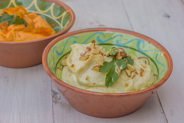 White humus on a wooden table