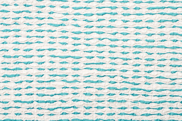 Blue and white wavy striped background. Abstract diagonal stripes like water pattern on fabric.