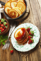 Homemade pancake with strawberry jam