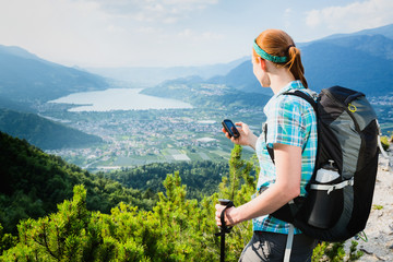 Hiker Navigating with a GPS Device