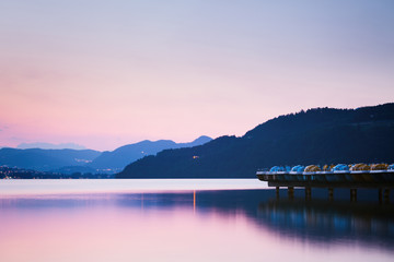Fototapeta na wymiar Quiet Mountain Lake by Sunset