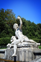 The baroque residence of Caserta in Italy, the lake, the statues.