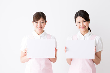 young asian care worker isolated on white background