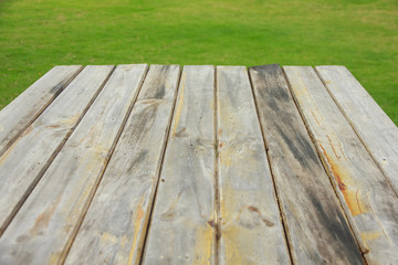 Stock Photo:.Wood plank on natural green grass