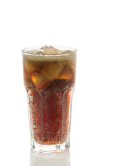 Cola glass with ice cubes on a white background