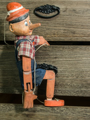 Pinocchio puppet made from wood.These items are a collection of my own.        