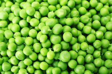 Heap of fresh green peas close up