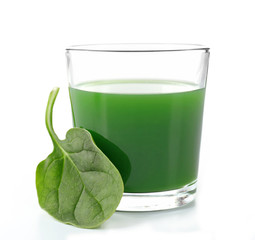Glass of spinach juice isolated on white