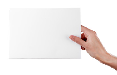 Fototapeta premium Female hand holding paper blank isolated on white