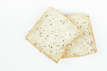 fresh sliced wholewheat bread with various seeds and multigrain on isolated white background