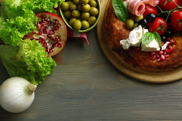 Ingredients of Mediterranean cuisine, on wooden background