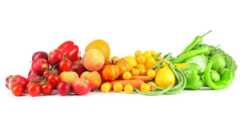 Naklejka na ściany i meble Heap of fresh fruits and vegetables isolated on white