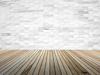 perspective wood plank floor with over blur Brick wall background