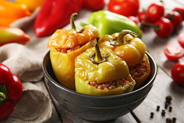 Stuffed peppers with vegetables on table close up