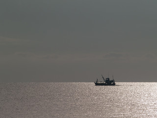 Fishing Boat at Sunrise