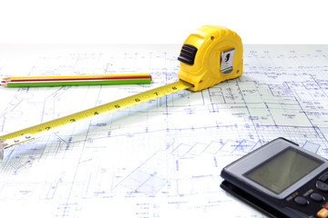 Measuring tape on Blueprint Architectural drawings paper.site office. construction work