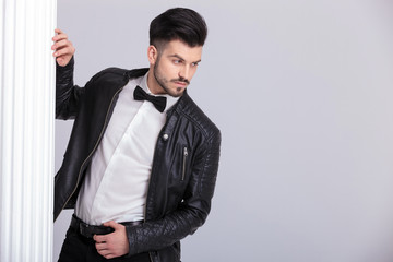 Casual business man looking down