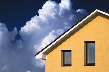 abstract beautiful house facade under blue sky