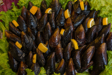 Oysters with lemons at market