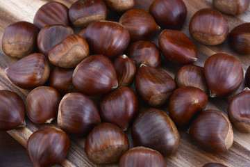 Chestnuts on Rustic Wood Table