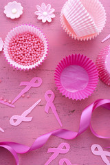 Obraz na płótnie Canvas Pink Ribbon Charity Event Cupcake Preparation