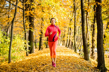 Woman jogging and listening music