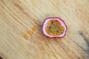 Passion fruit on wooden background