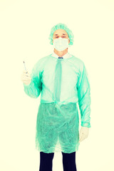 Male doctor with a scalpel 