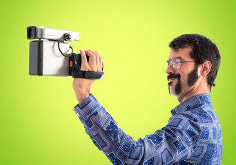 Vintage young man filming