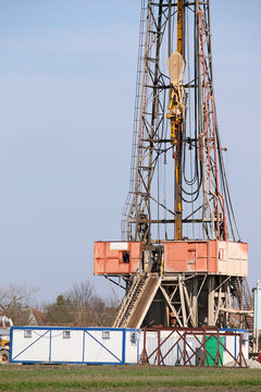 oil drilling rig and equipment on field