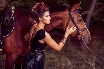 Fototapeta na wymiar Fashion model with horse