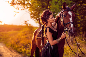 Fototapeta premium Fashion model with horse