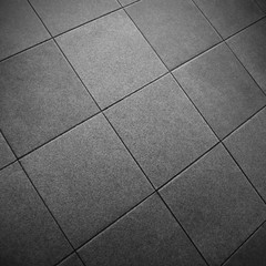 Fototapeta na wymiar Gray Square Tile Floor