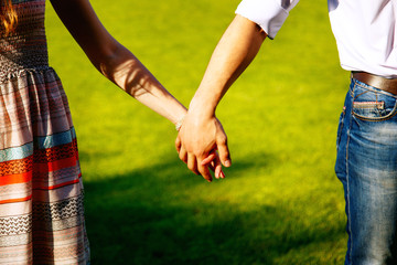 Couple holding hands