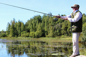 spinning fisherman lake landscape