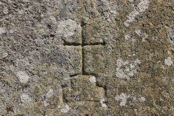 Symbole sculpté dans la pierre.