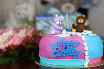Obraz na płótnie Canvas birthday cake with bears and flowers