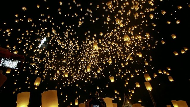 Loi Krathong Festival, thousands of floating lanterns in the night sky in Chiang Mai, Thailand.