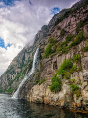 Waterfall in the Lysefjord, Norway - nature and travel background.