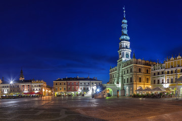 Fototapeta na wymiar Town Hall at night in Main Square. Zamosc, Poland.
