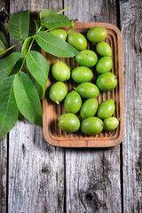 Young green walnuts