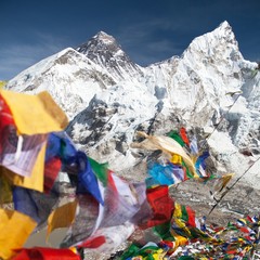 view of Mount Everest with buddhist prayer flags