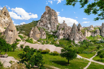 Natural fortress of Uchisar, riddled with man-made dwellings and dovecotes, dominates the skyline of Cappadocia.