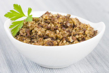 Haggis - Traditional Scottish dish made of sheep's pluck oatmeal and spices.
