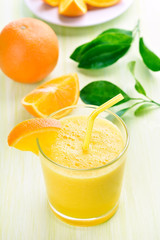 Orange smoothie and slices
