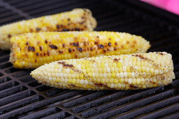 Corn roast on barbecue grille.