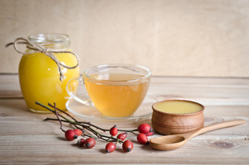 Still life from cup of tea , honey and hawthorn