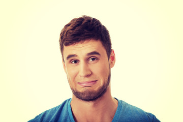 Obraz premium Young depressed man.