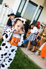 Obraz premium Halloween: Cute Trick or Treater with Flashlight